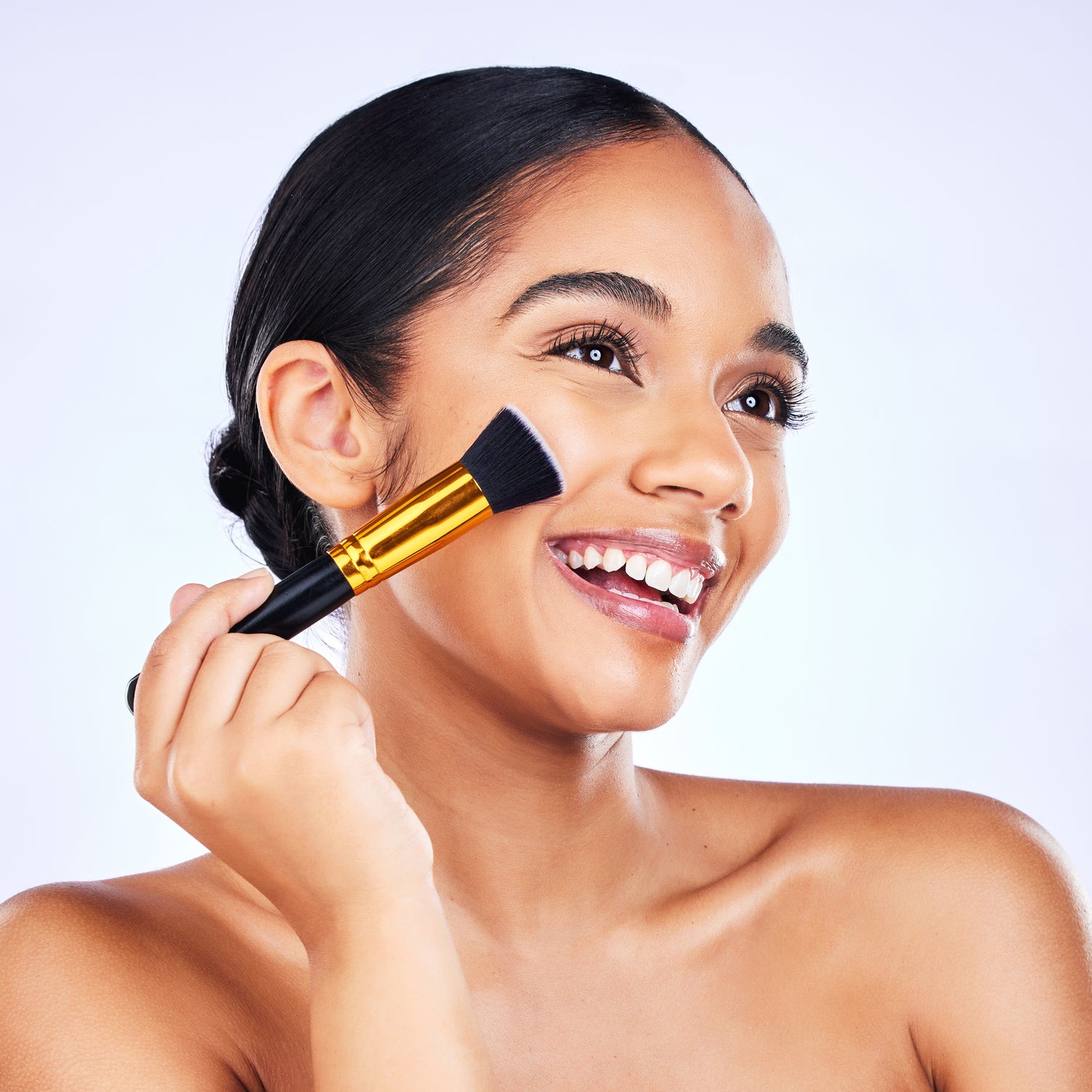 beauty-makeup-brush-and-cosmetics-of-a-happy-woma-2023-11-27-05-08-32-utc.jpg